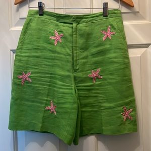 C J Laing lime green 100% linen shorts with pink floral embroidered print.
